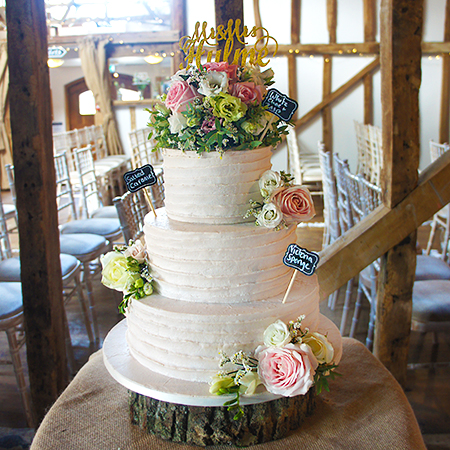 Rough layered Buttercream Wedding Cake