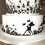 Hand painted black silhouette with sugar flowers