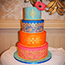Bright and colourful Indian wedding cake
